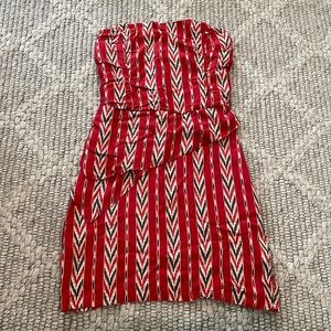 MYNE Red print strapless dress no size tag- likely XS or 0. Small tear on bottom